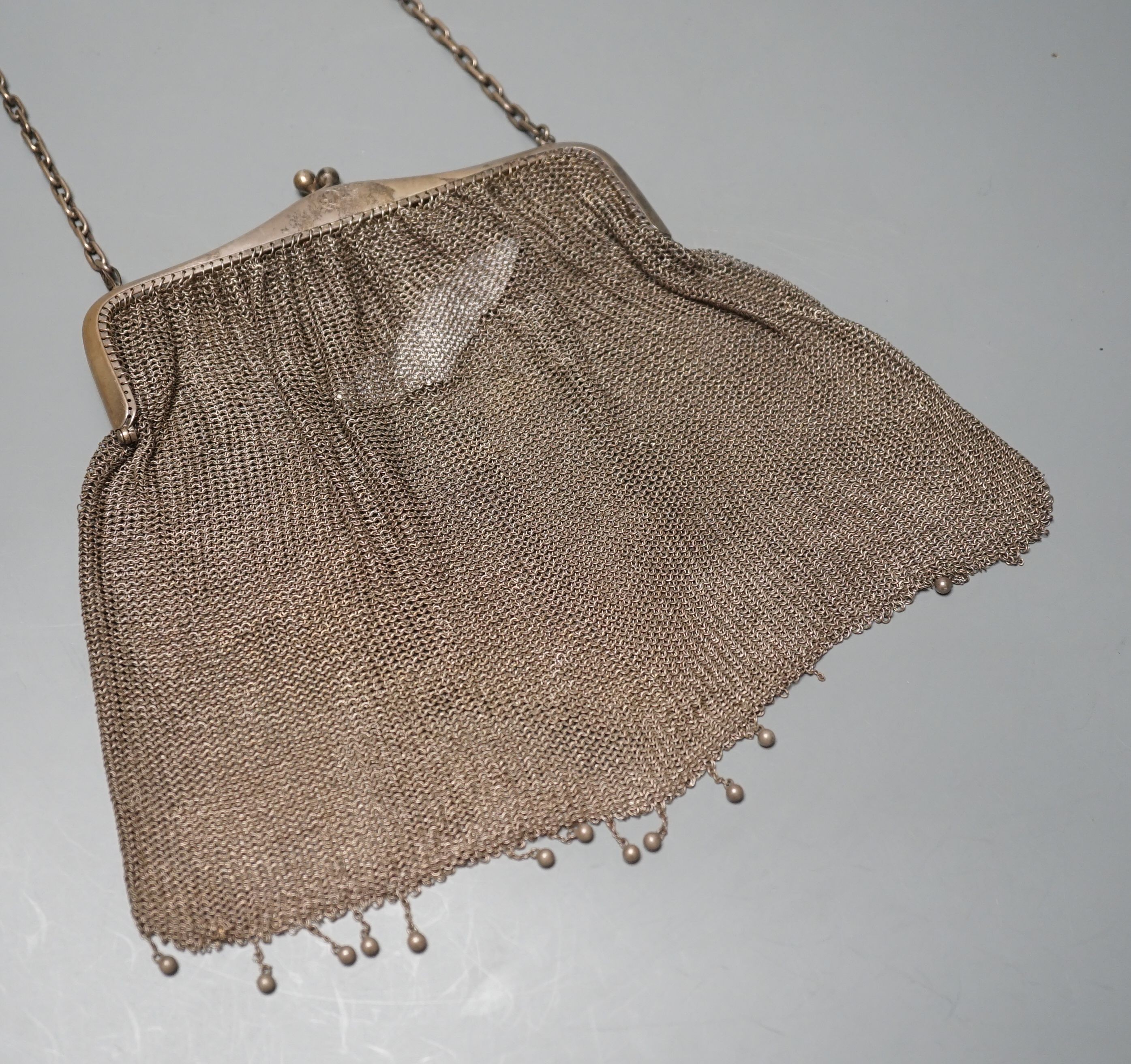 A George V silver mesh evening bag, import marks for London, 1912, 11.5oz.